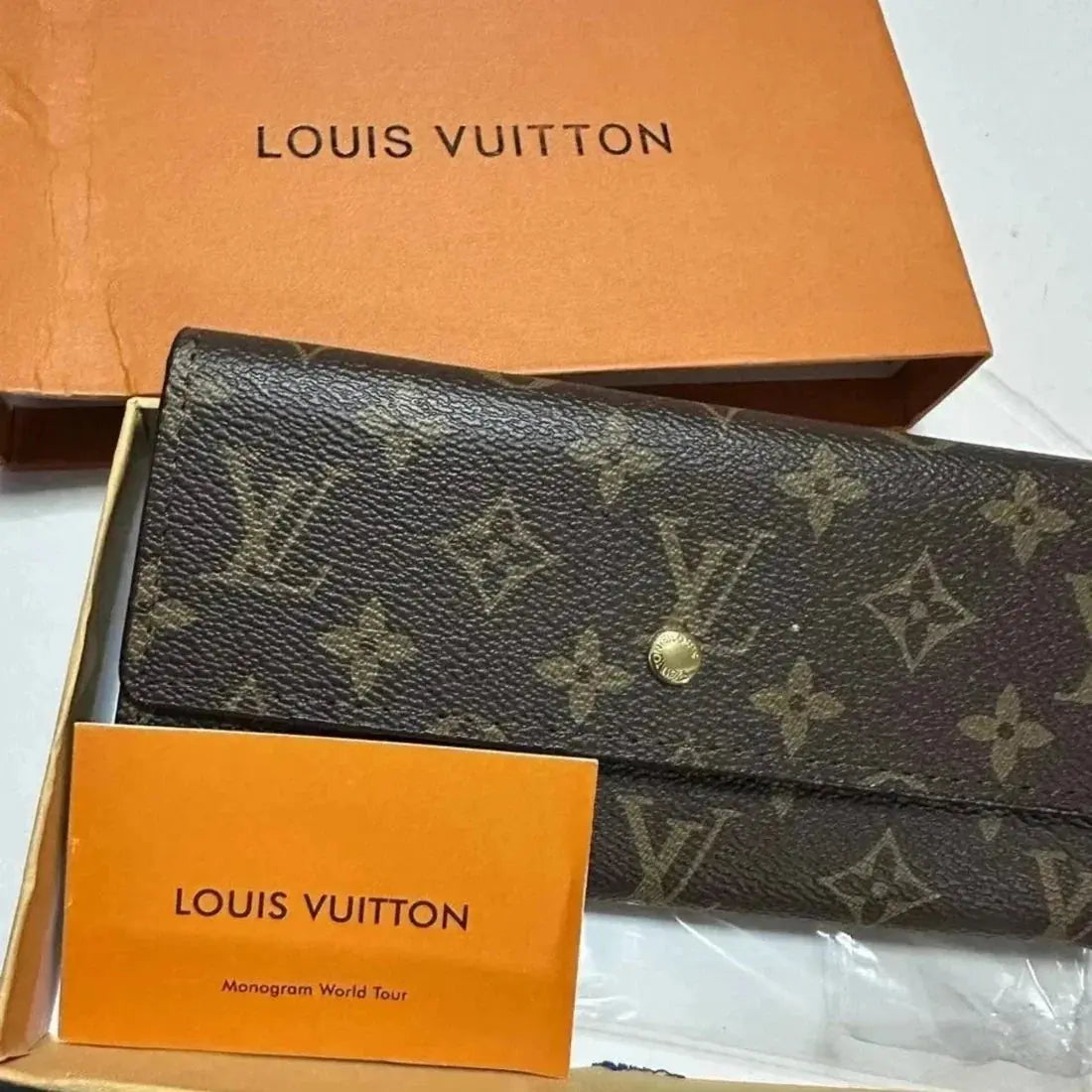Authentic Louis Vuitton Portefeuille Sarah Long Wallet - Monogram Canvas NORTH WAVE SCENTORA